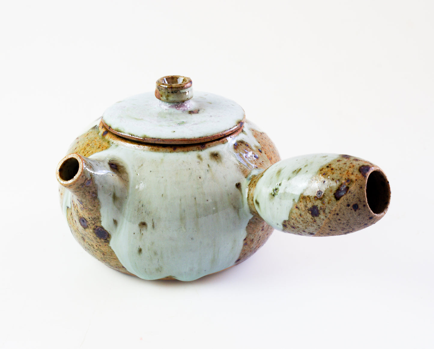 Right handed side handle tea pot
