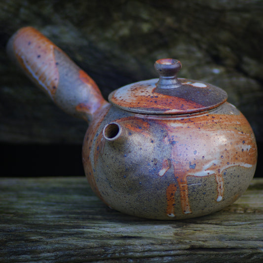 large lefthanded sidehandle teapot